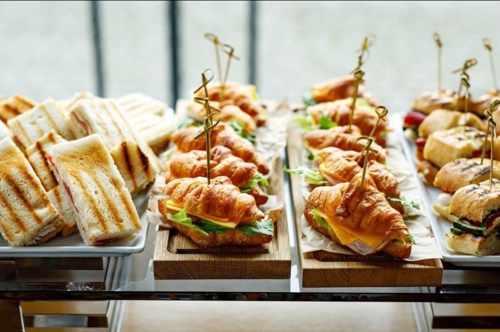 Office catering with sandwiches, wraps, juices and refreshments prepared for a meeting.